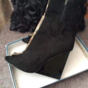 Suede, python print wedge heel.  Cute!!